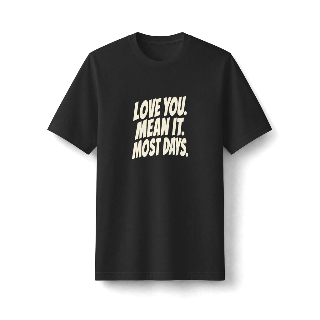 "Love You. Mean It. Most Days." funny couples graphic on a black Next Level heavyweight oversized tee - Couples Therapy Apparel