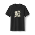"Love You. Mean It. Most Days." funny couples graphic on a black Next Level heavyweight oversized tee - Couples Therapy Apparel