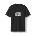 "Bless This Mess We Call a Marriage" funny couples graphic on a black Next Level heavyweight oversized tee - Couples Therapy Apparel